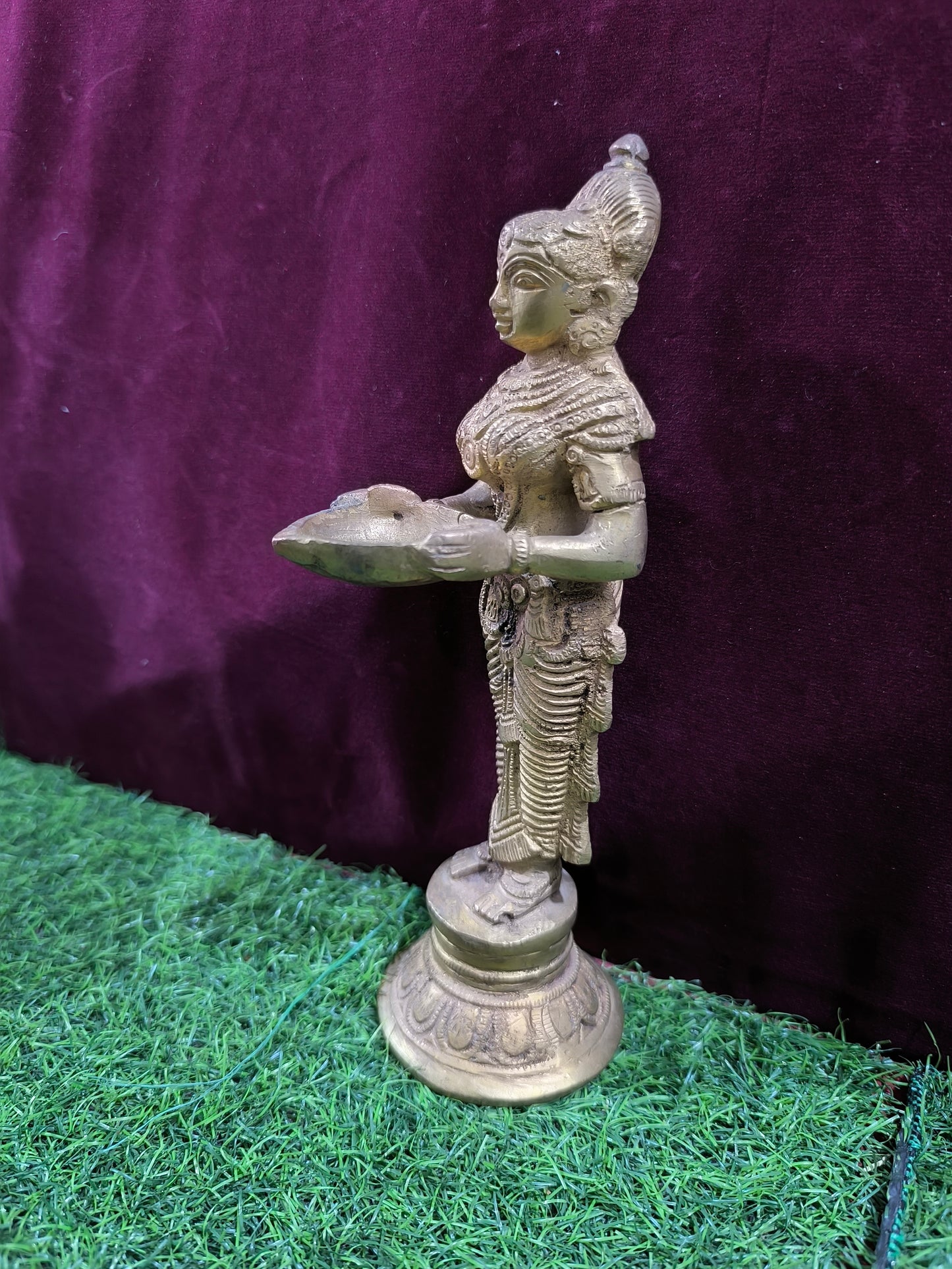 Lakshmi holding lamp Idol